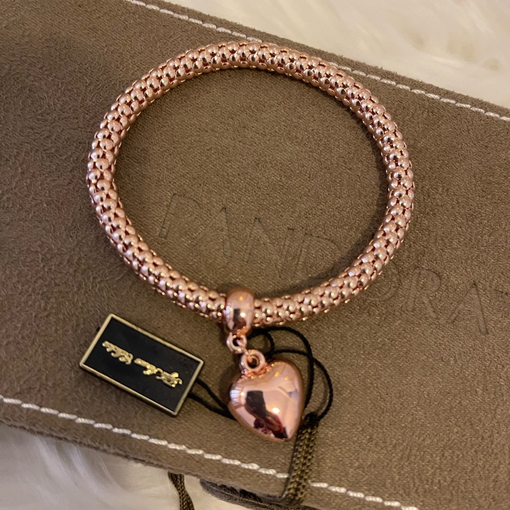 NWT- SAKS FIFTH AVE. Rose gold stretch mesh heart dangling bracelet O/S